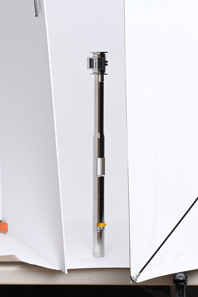 reflective-product-photography-pre-production-lighting-planning-industrial-sensor - Brian Mullins | Commercial & Event Photographer Based in Raleigh Pre-production lighting test for photographing a reflective stainless steel industrial sensor using white bounce cards and controlled studio setup