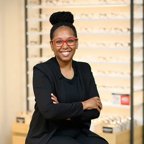 Professional indoor headshot of corporate manager featured in testimonial.